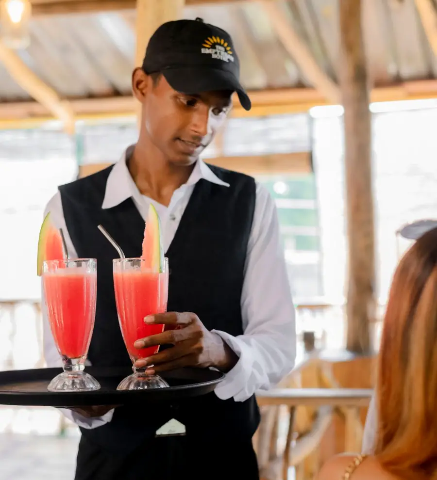 Empyrean staff serving fresh juice